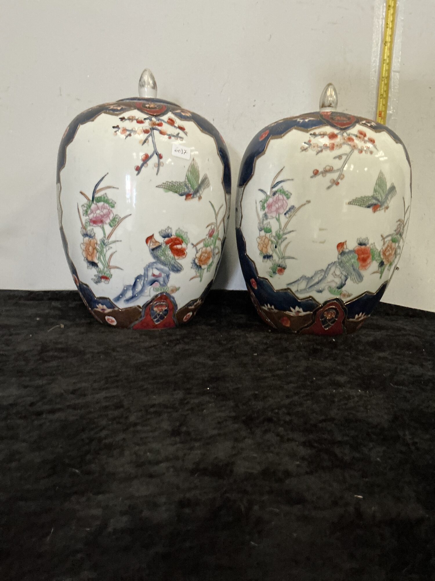 Pair of Japanese Imari porcelain ginger jars with covers