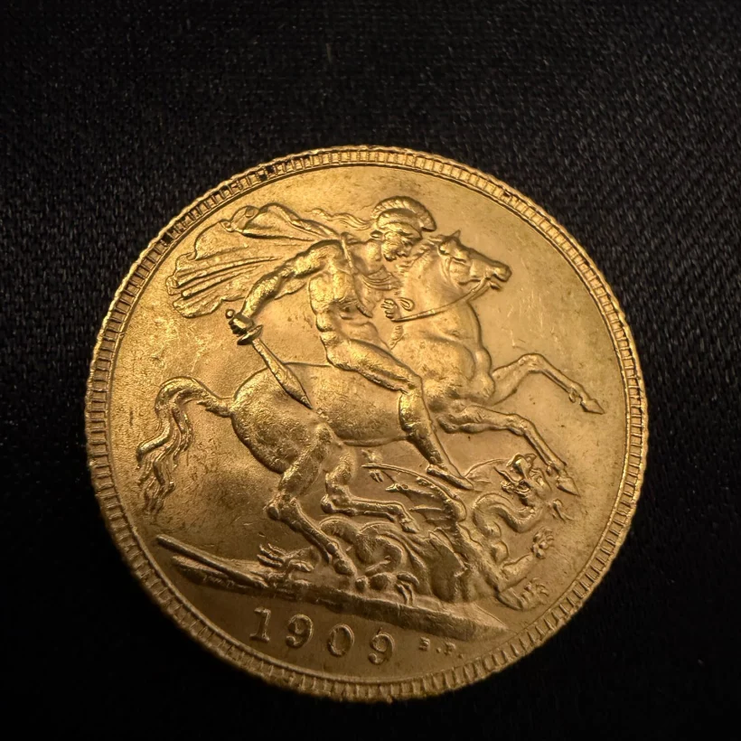 A 1909 Edward VII gold sovereign, St George reverse, photographed for a Shelbys sale