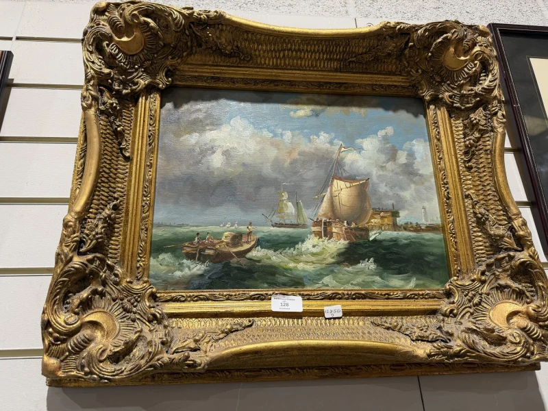 19th-century marine oil painting in a gilded rococo frame